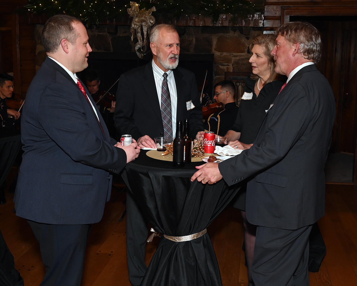 Guests standing around table