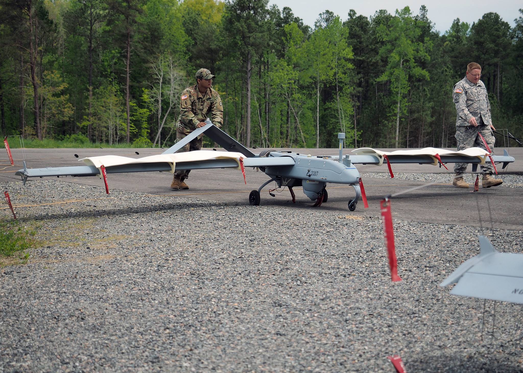 North Carolina Army National Guard Soldiers, recover a RQ-7 Shadow Unmanned Aerial Vehicle at Lowe Field on Fort Walker.