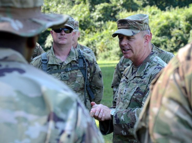 Virginia National Guard Soldiers assigned to the Sandston-based 2nd Battalion, 224th Aviation Regiment visit with Maj. Gen. Timothy P. Williams, the Adjutant General of Virginia, during their annual training July 21, 2019, at Fort Walker, Virginia.