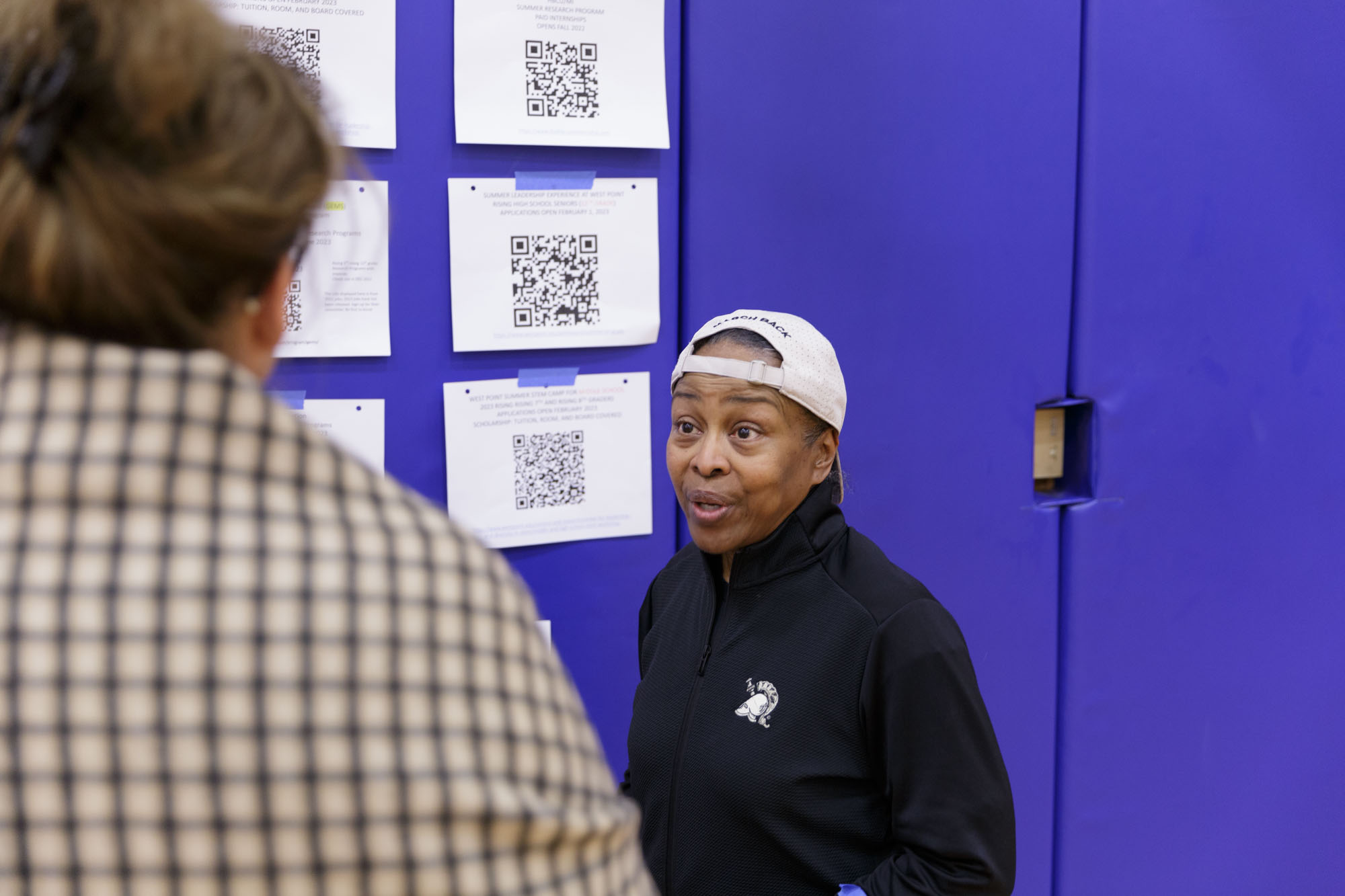 Pat Locke speaks to a parent about Army internships at Graves Gym, Oct. 1.