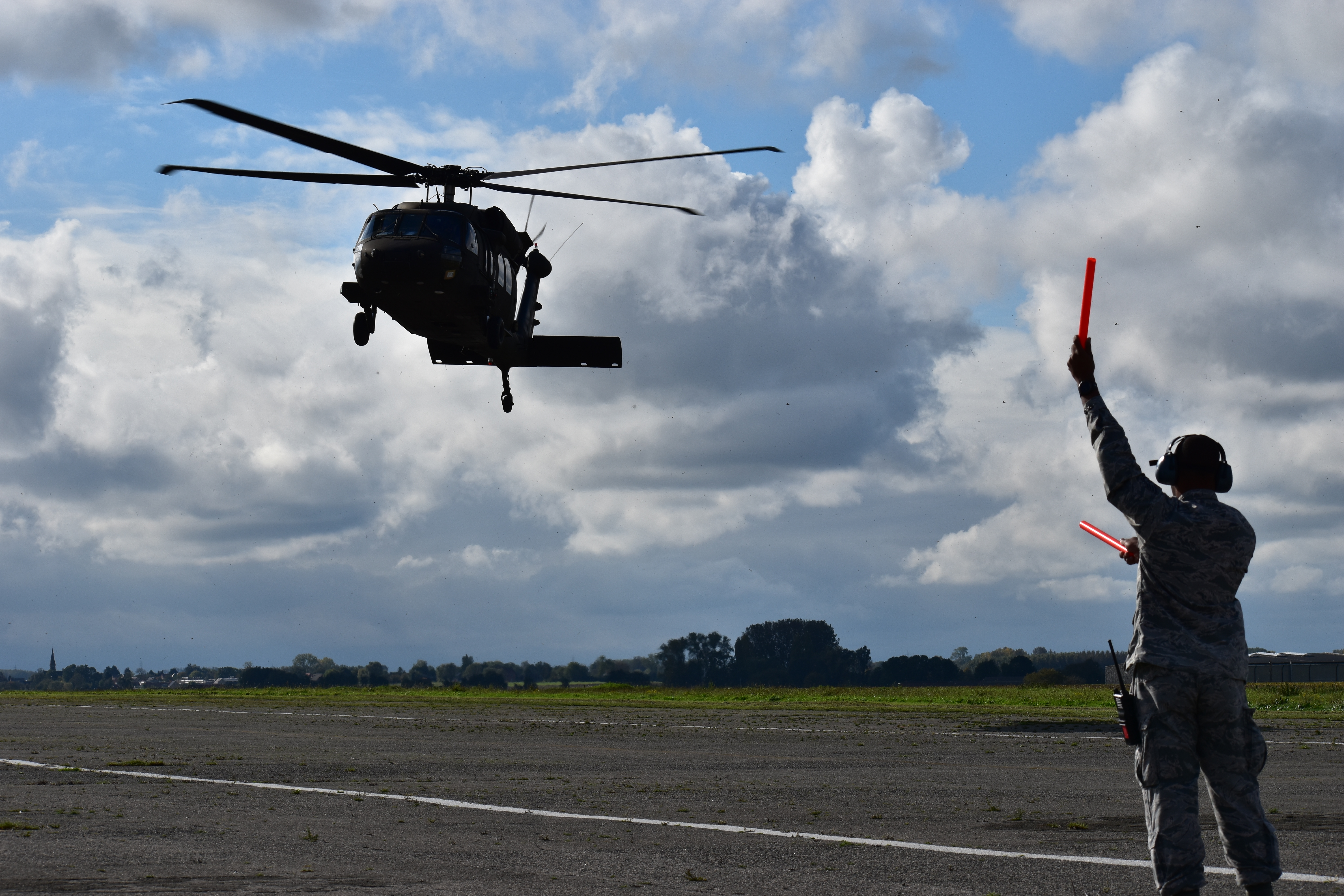 A photograph of a helicopter landing