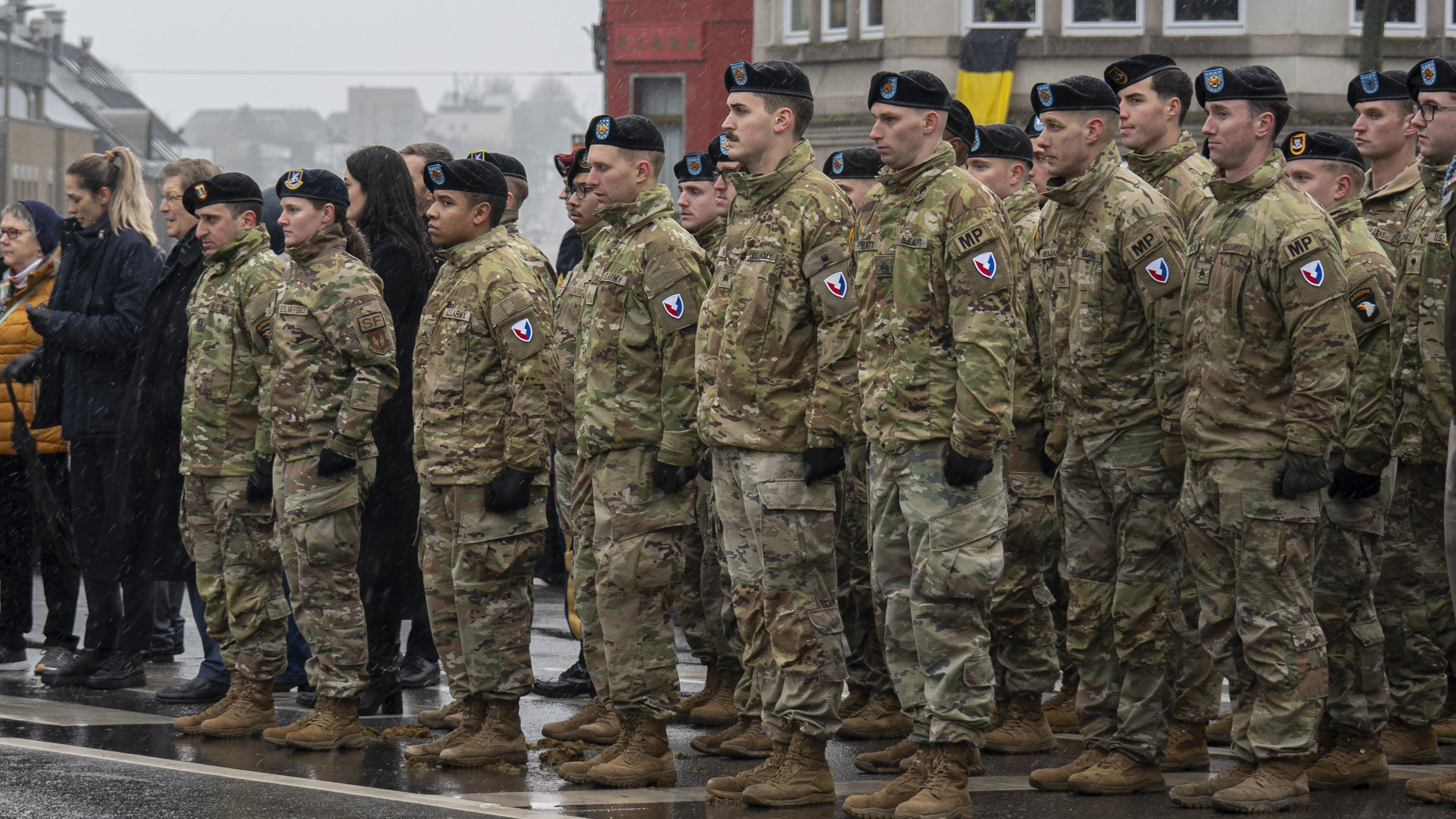 A photograph of a color guard at a ceremony