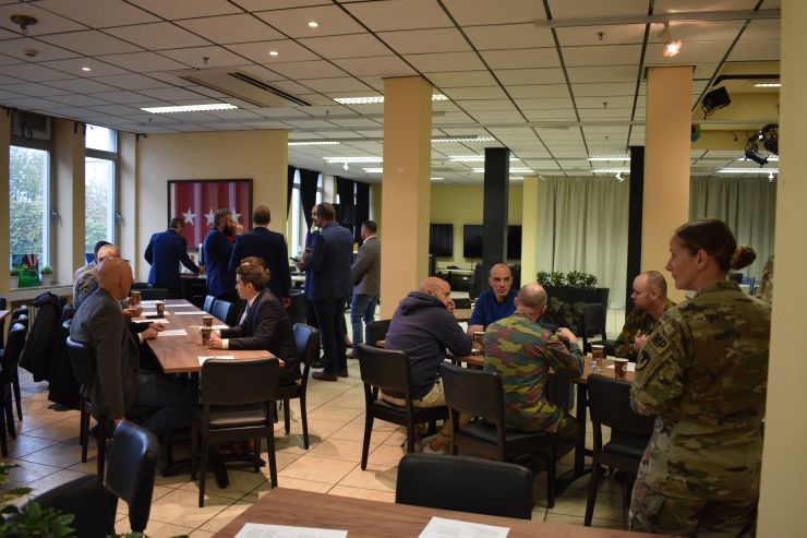 a photo of a group of people eating breakfast