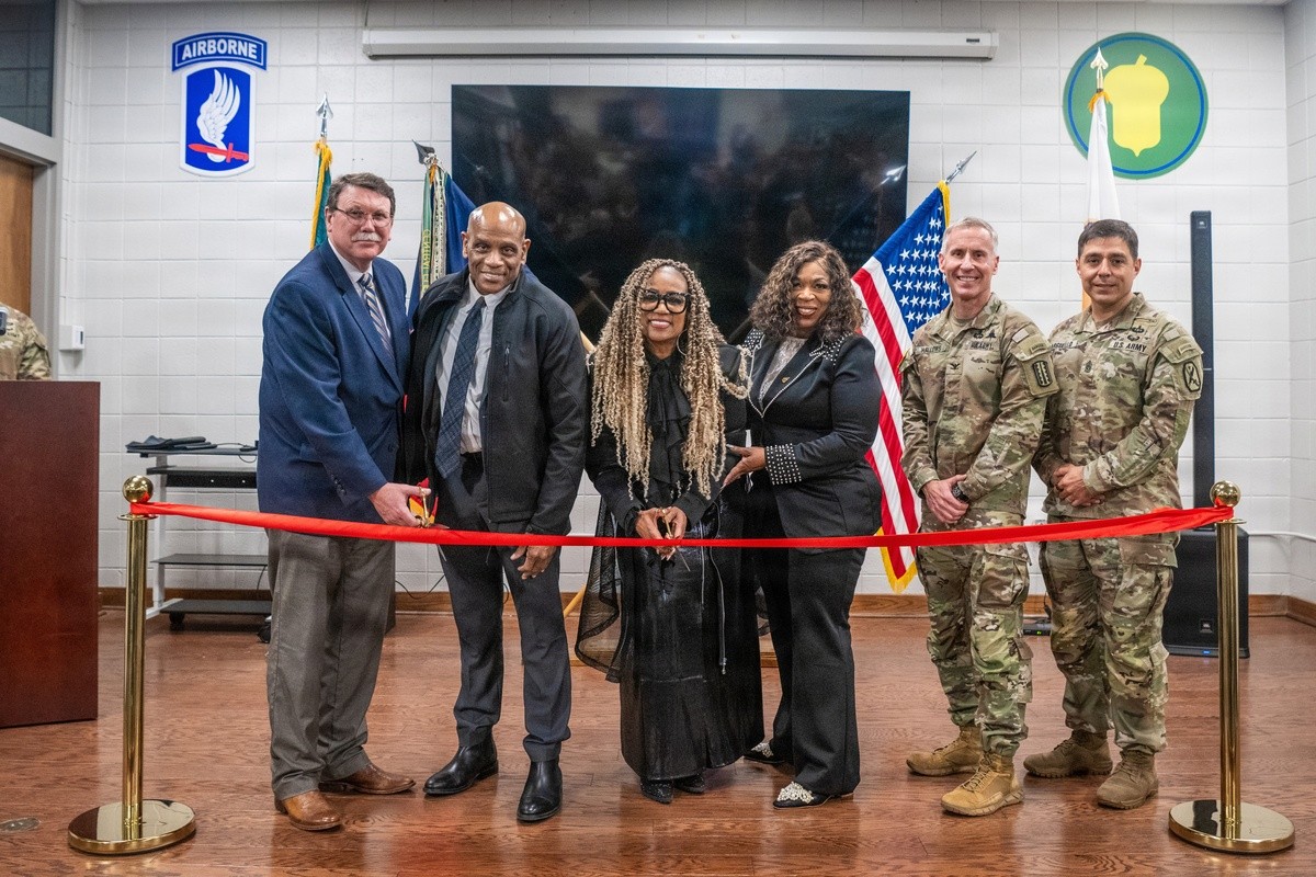 Fort Benning leaders and members of the Crook family cut the ceremonial ribbon for the newly dedicated Command Sgt. Maj. Edward “Eddie” Crook Jr. Soldier Performance Readiness Center at Fort Benning, Ga., Feb. 27, 2026. The state-of-the-art facility, designed to enhance Soldier readiness, was dedicated to Crook in recognition of his lifetime commitment to excellence as both an athlete and a decorated Army veteran. (Photo Credit: Patrick Albright)