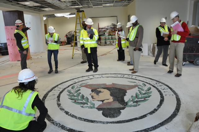 DPW team examines emblem
