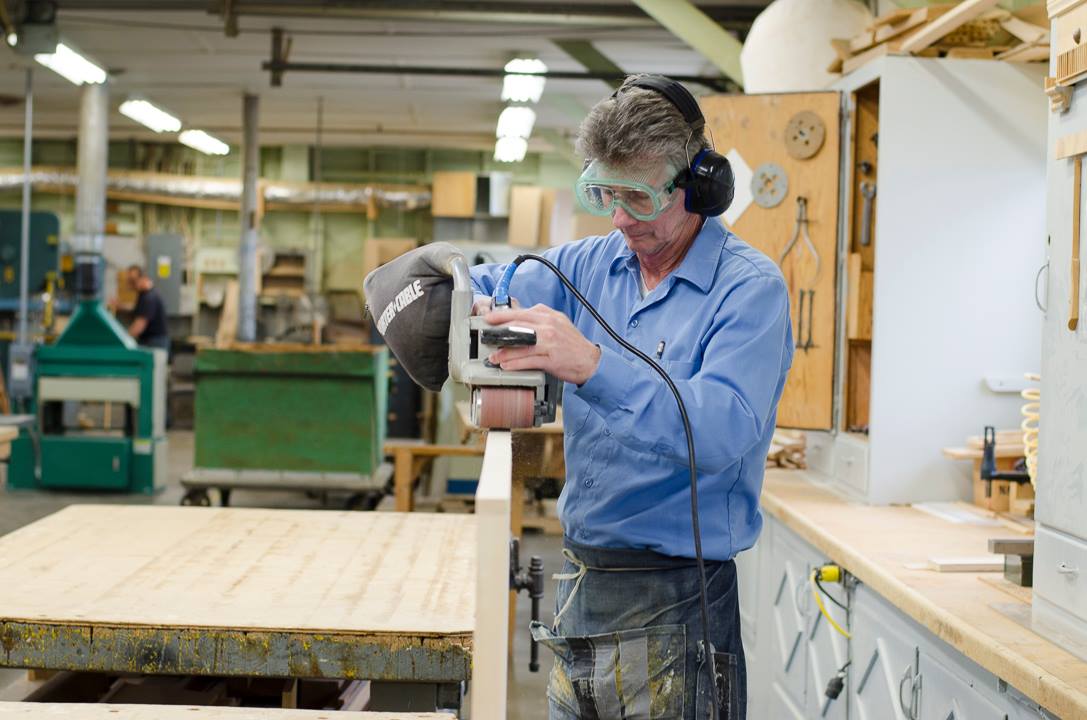 DPW employee wprks in wood shop.