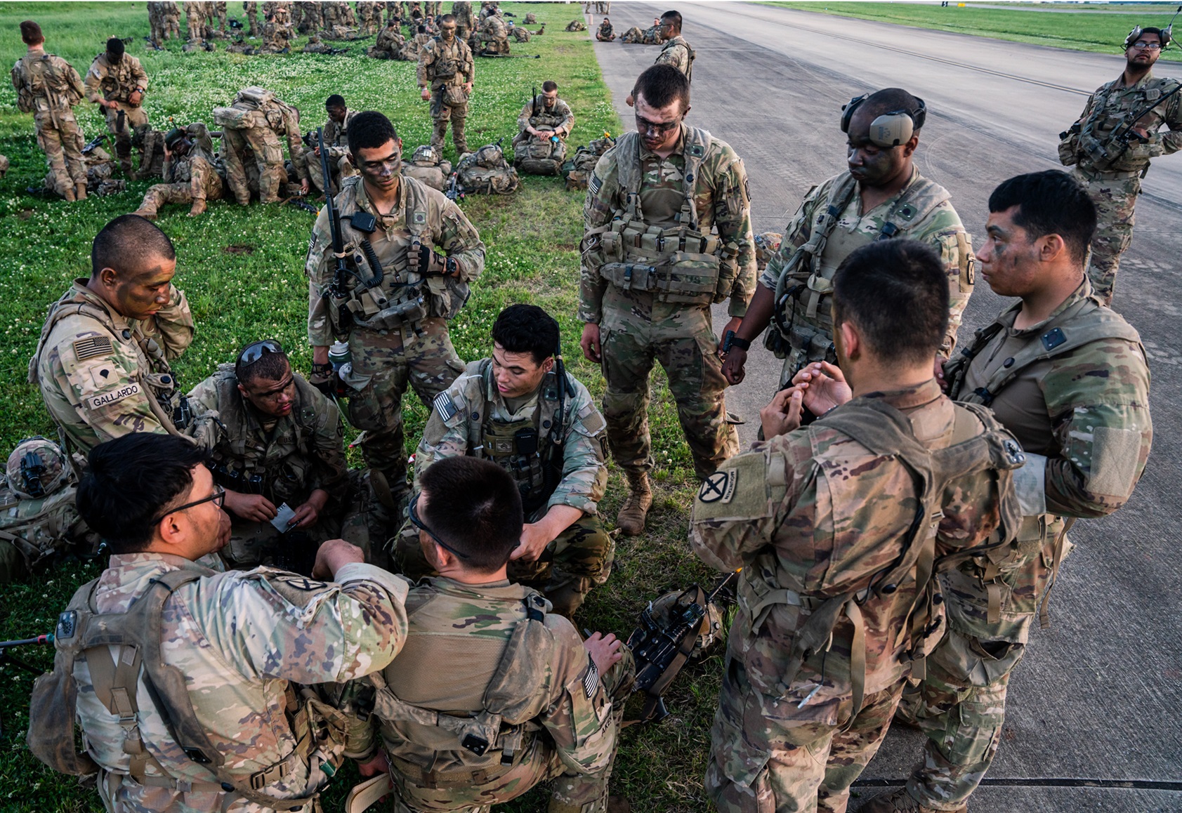 1st BCT Soldiers gather in a circle for instructions at Joint Readiness Training Center
