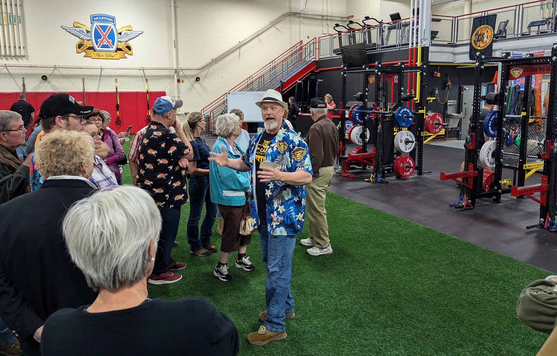 Visitors view workout equipment as they tour the Holistic Health and Fitness facility at Wheeler-Sack Army Airfield.