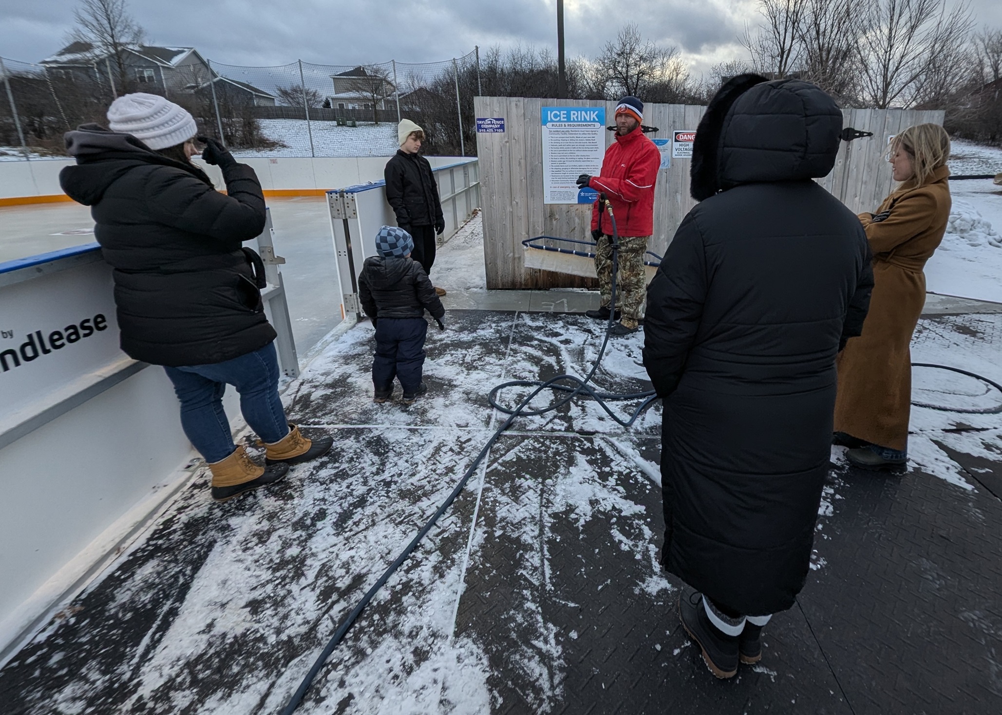 Fort Drum Ice Rink volunteers learn daily operations.
