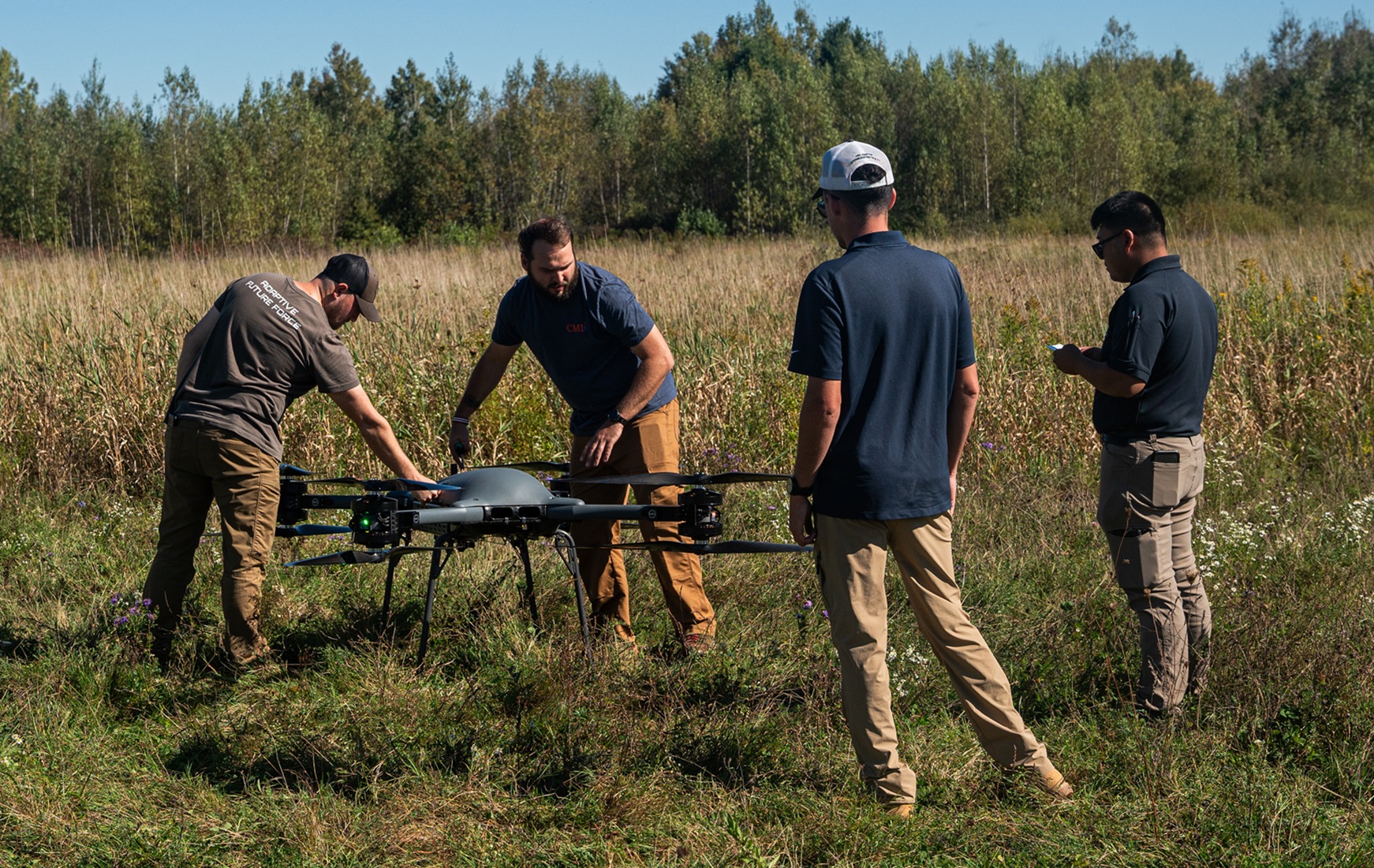 Industry partners prepare to calibrate a TRV-150 to sensors during Desert Guardian.