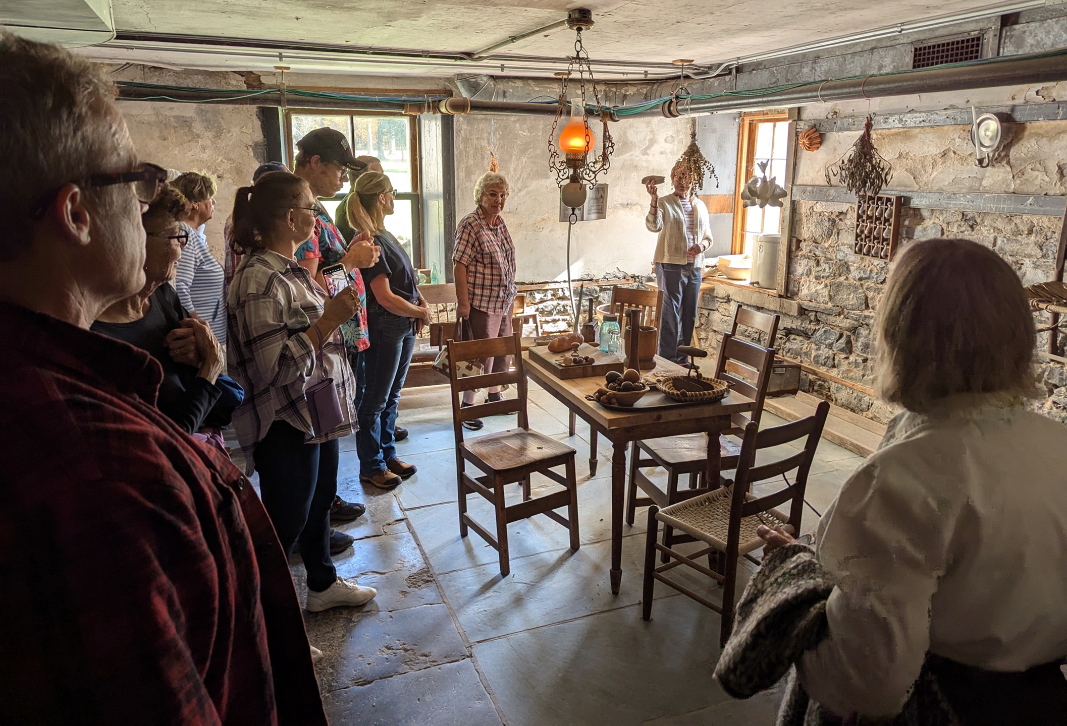Visitors tour LeRay Mansion Mansion and learn about its history from Dr. Laurie Rush.