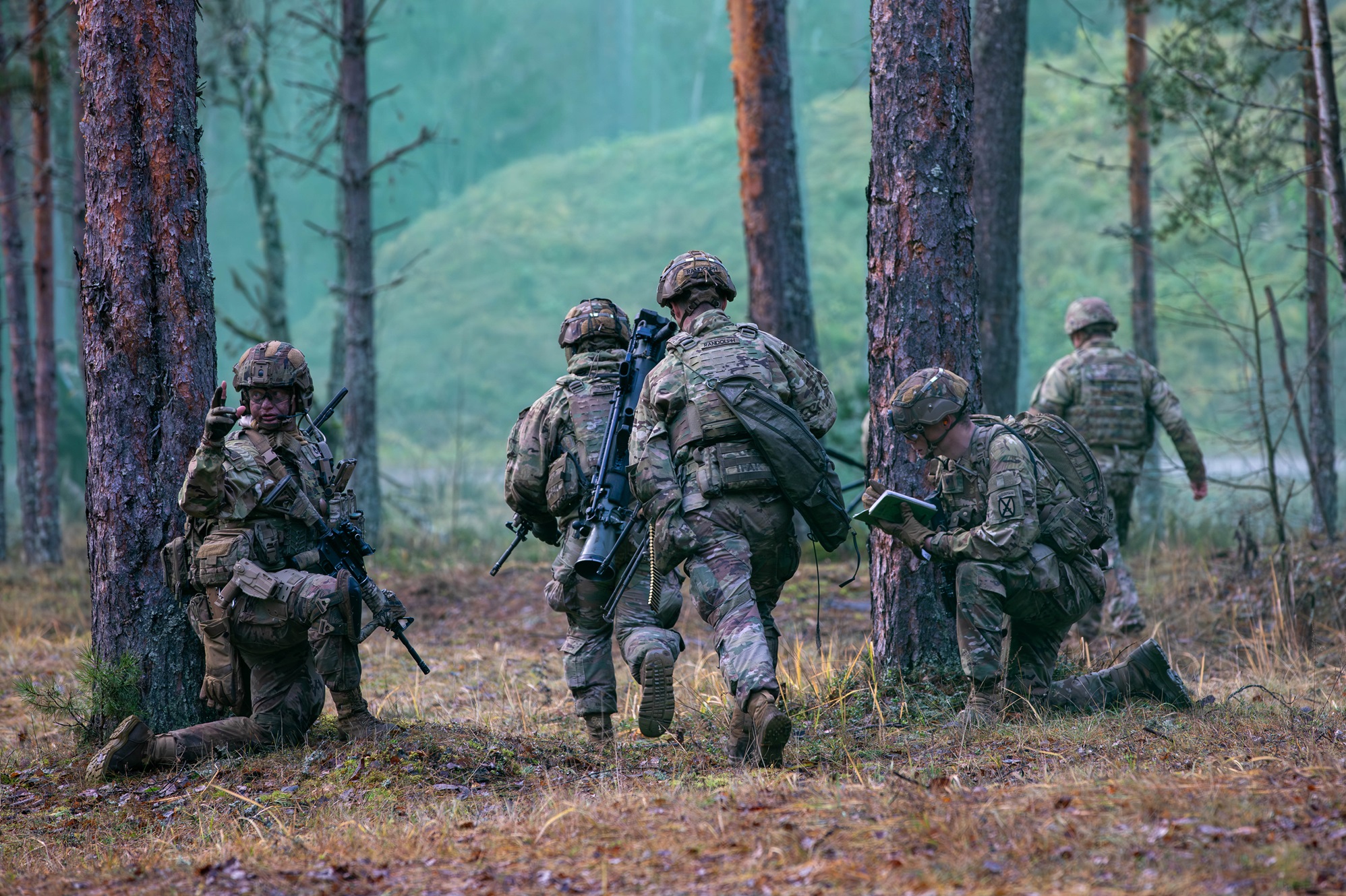 Soldiers move tactically towards the objective during a live fire-exercise in Estonia.