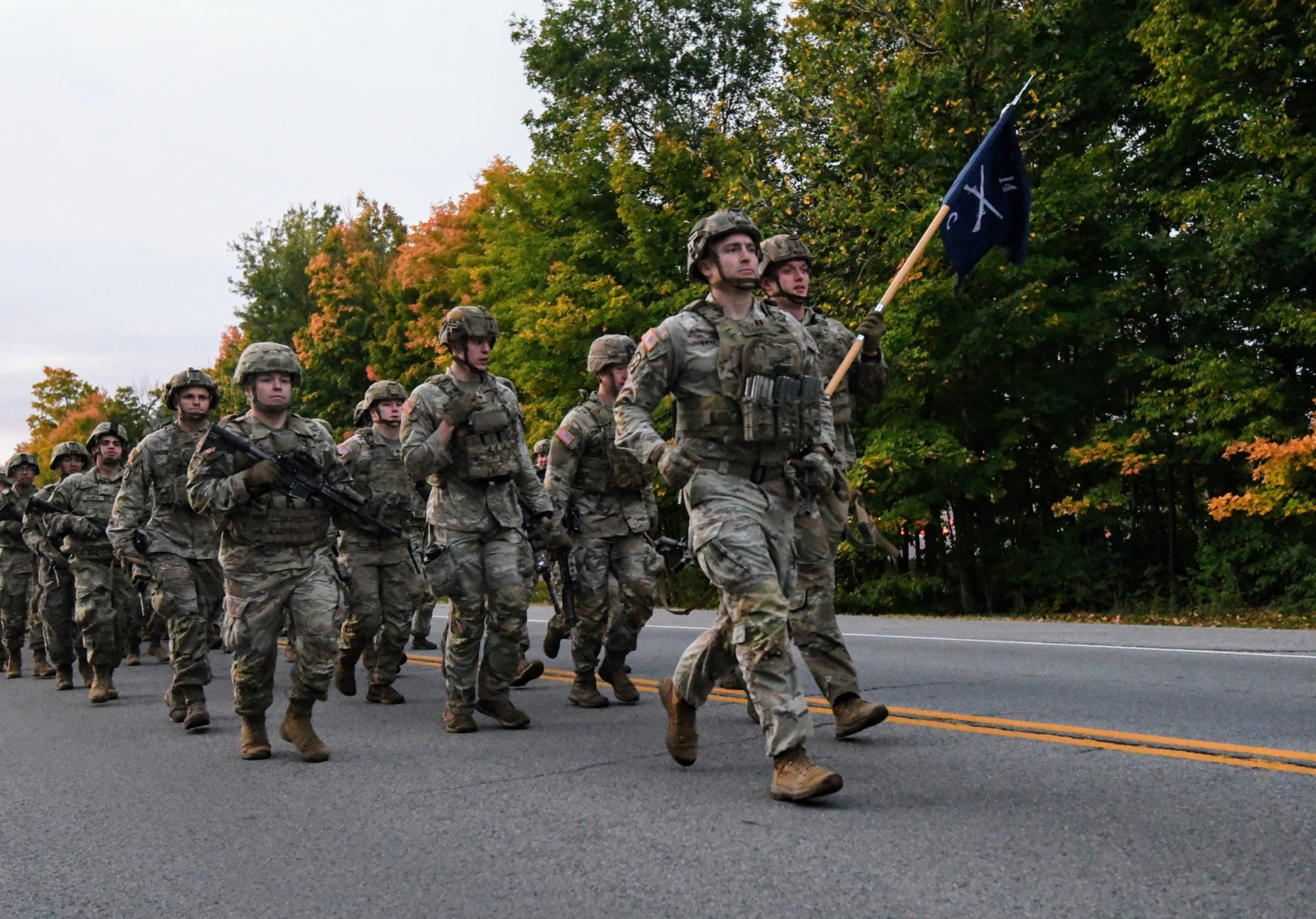Soldiers and veterans of 2-14 Infantry run the Mogadishu Mile during Dragon Heritage Day at Fort Drum.