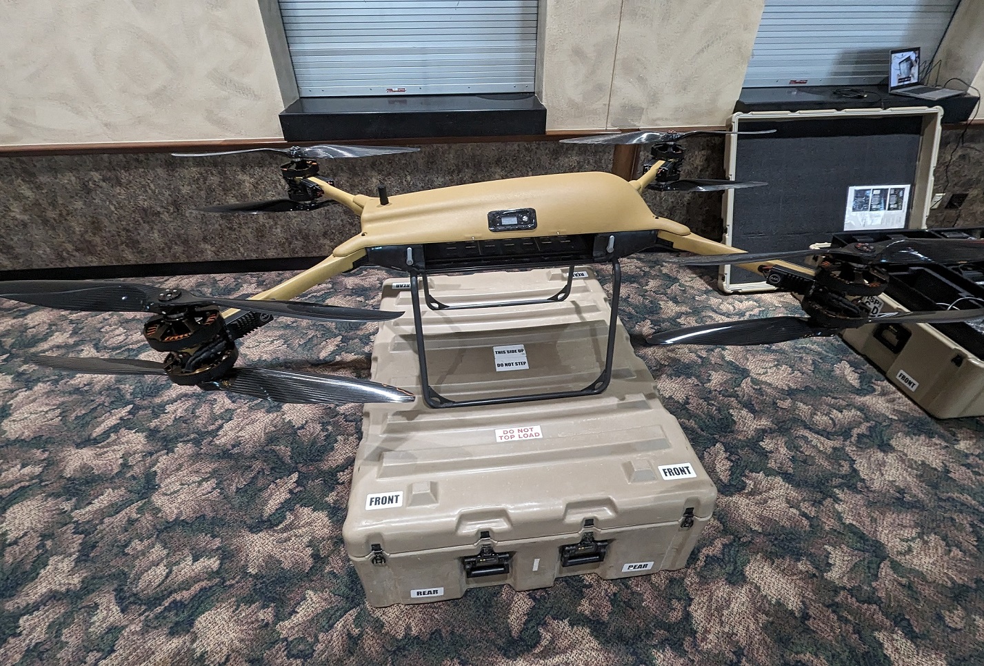 Tactical resupply vehicle is display inside room.