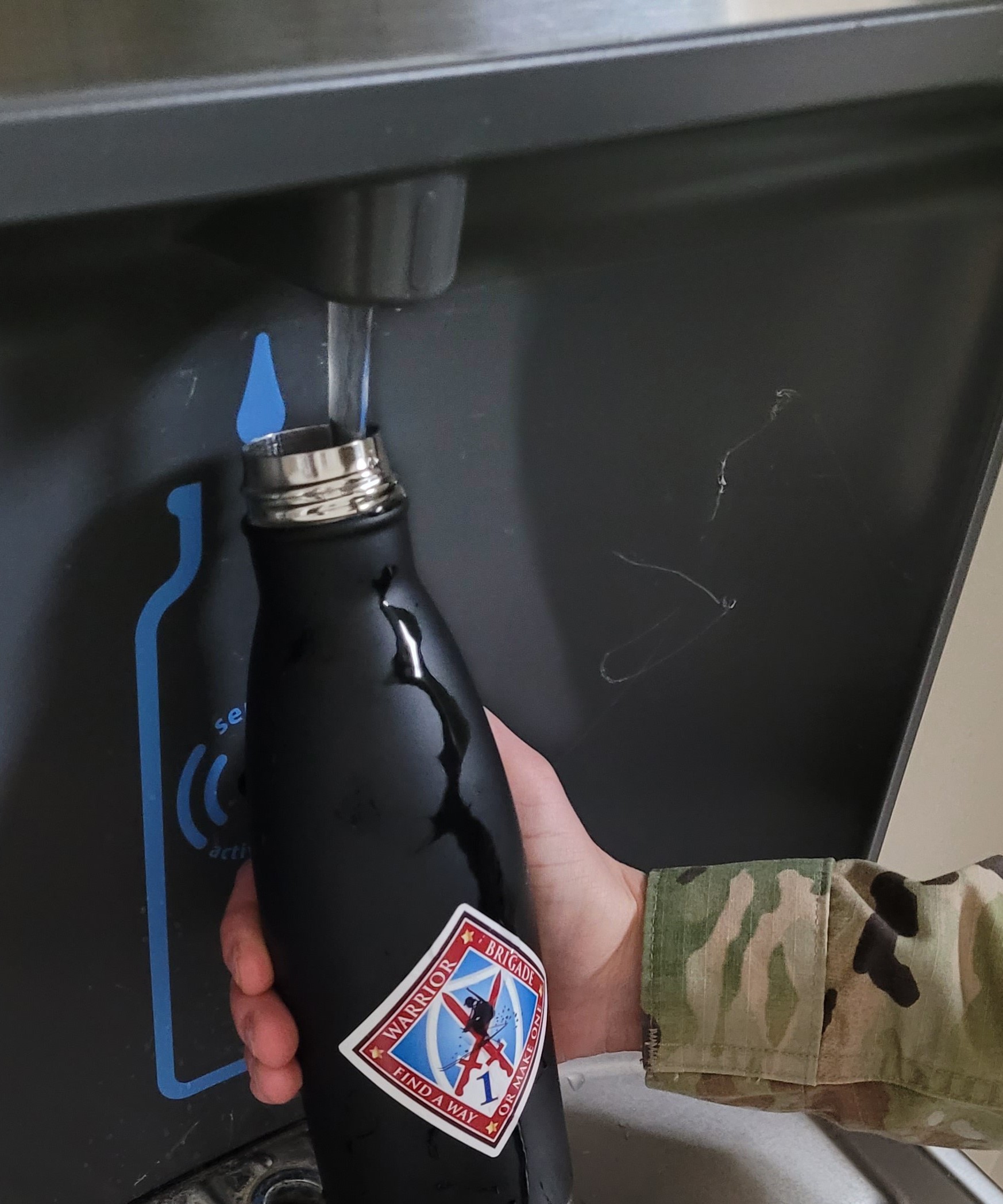 Water bottle at fountain cr.jpg
