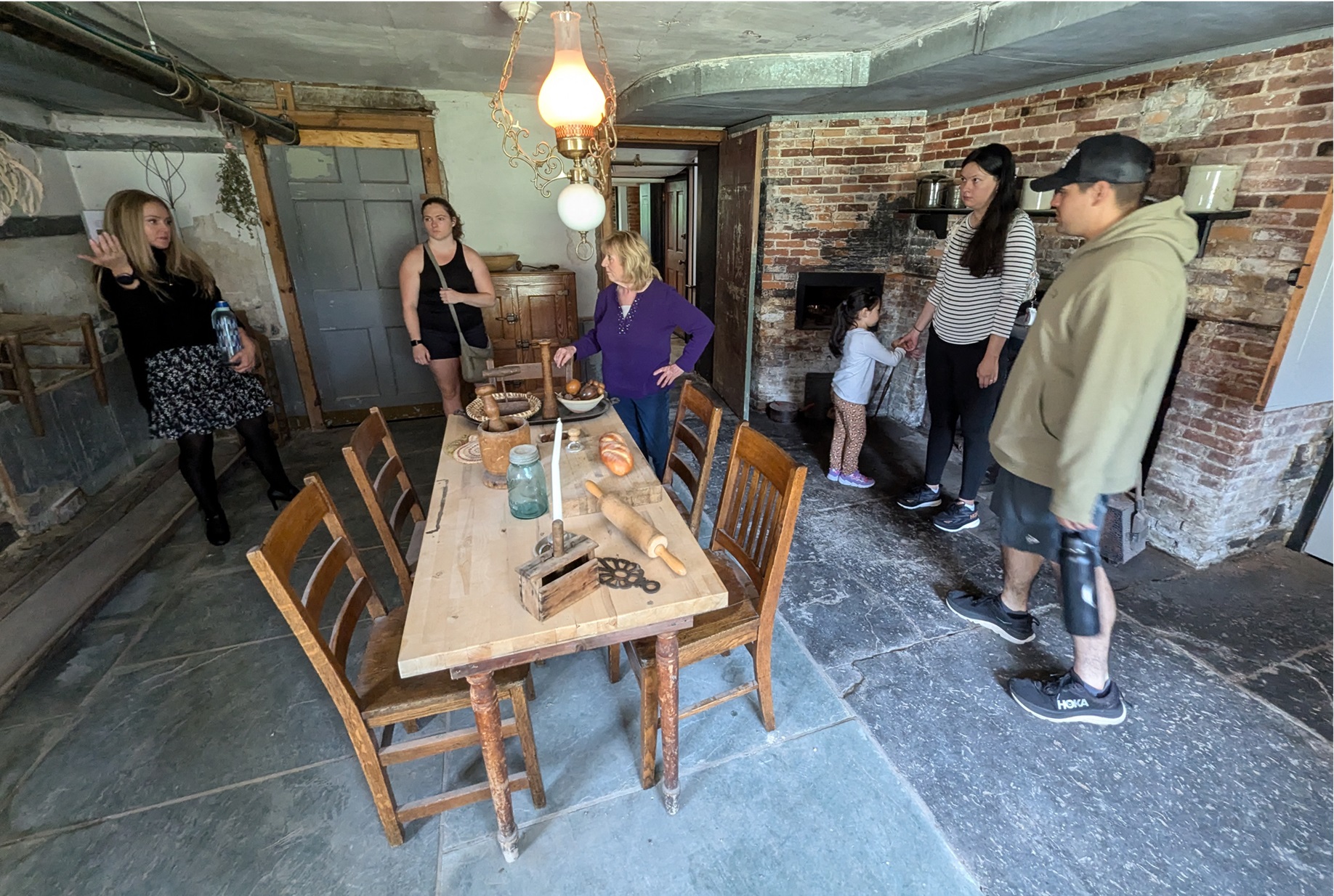 Community members explore LeRay Mansion during a stop on their mindfulness walk.