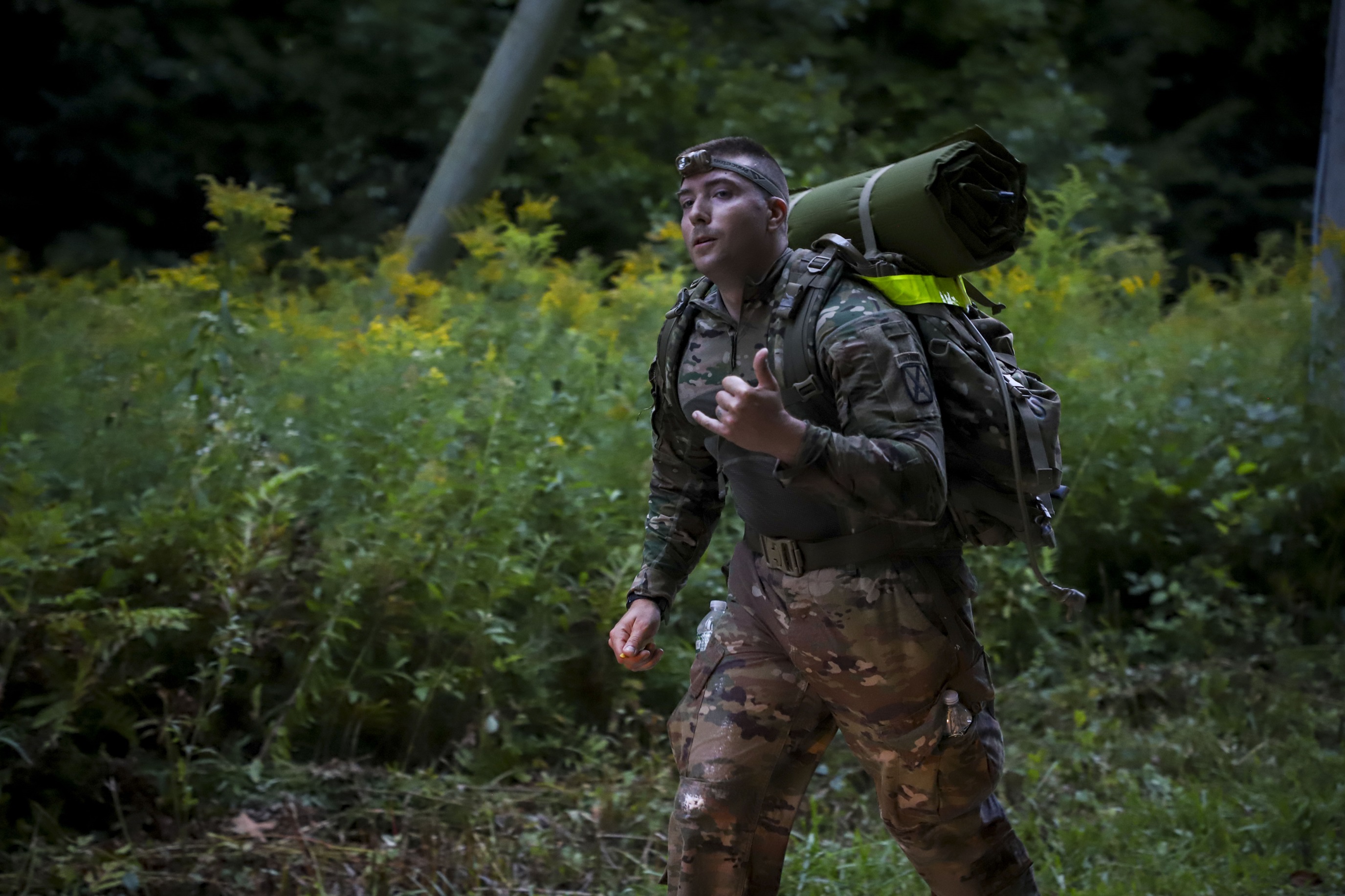 Soldier with rucksack participates in Norwegian Foot March at Fort Drum.