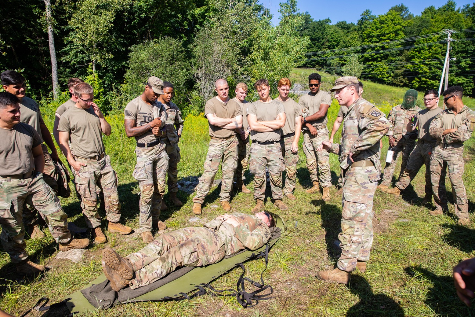 Medic instructs Soldiers how to conduct casualty evacuation procedures.