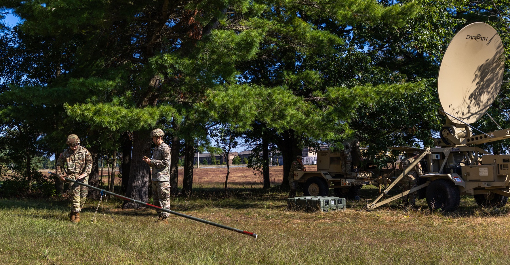 Soldiers work on establishing communications during an exercise on Fort Drum. 