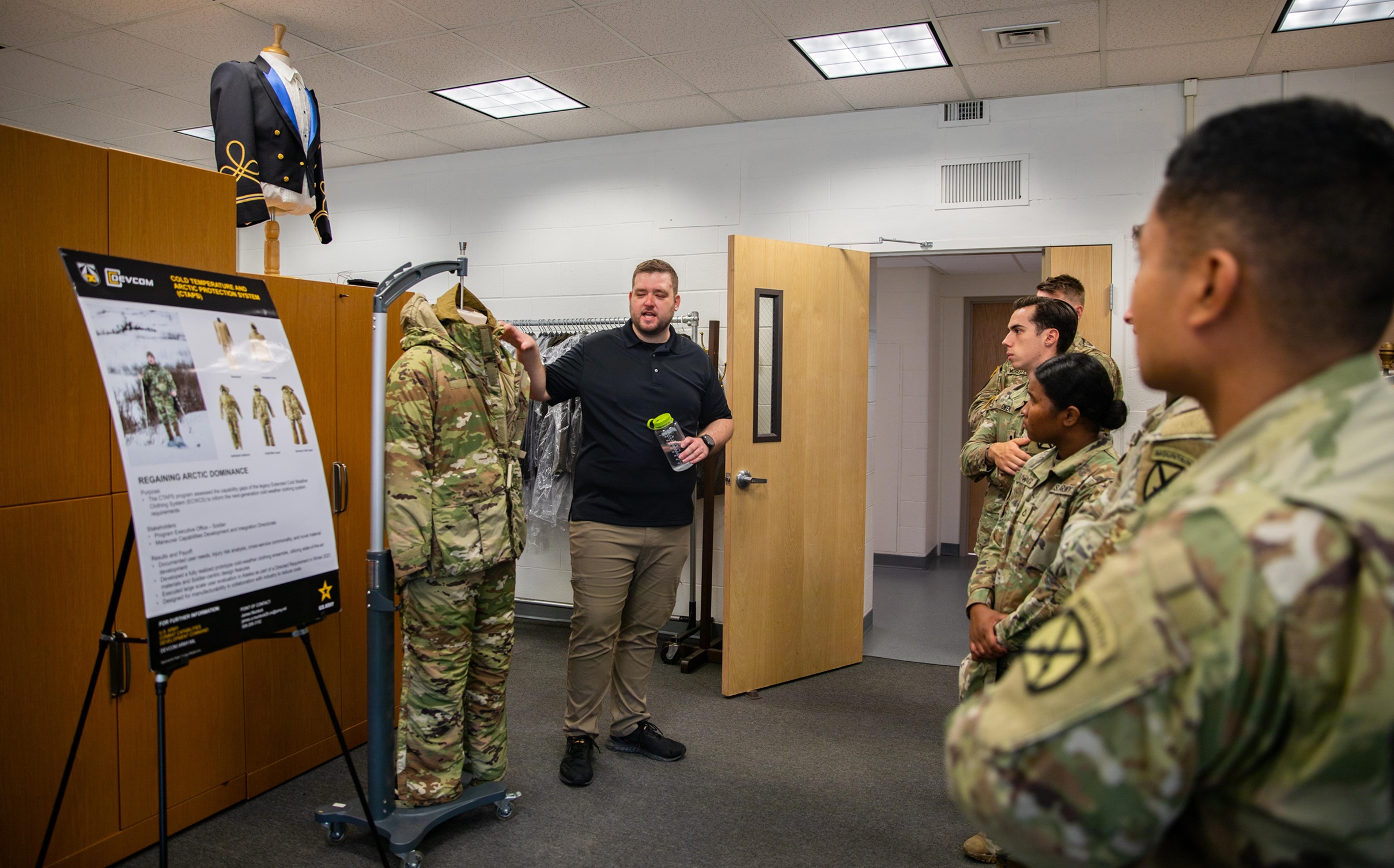 Soldiers receive presentation on cold weather protection system.