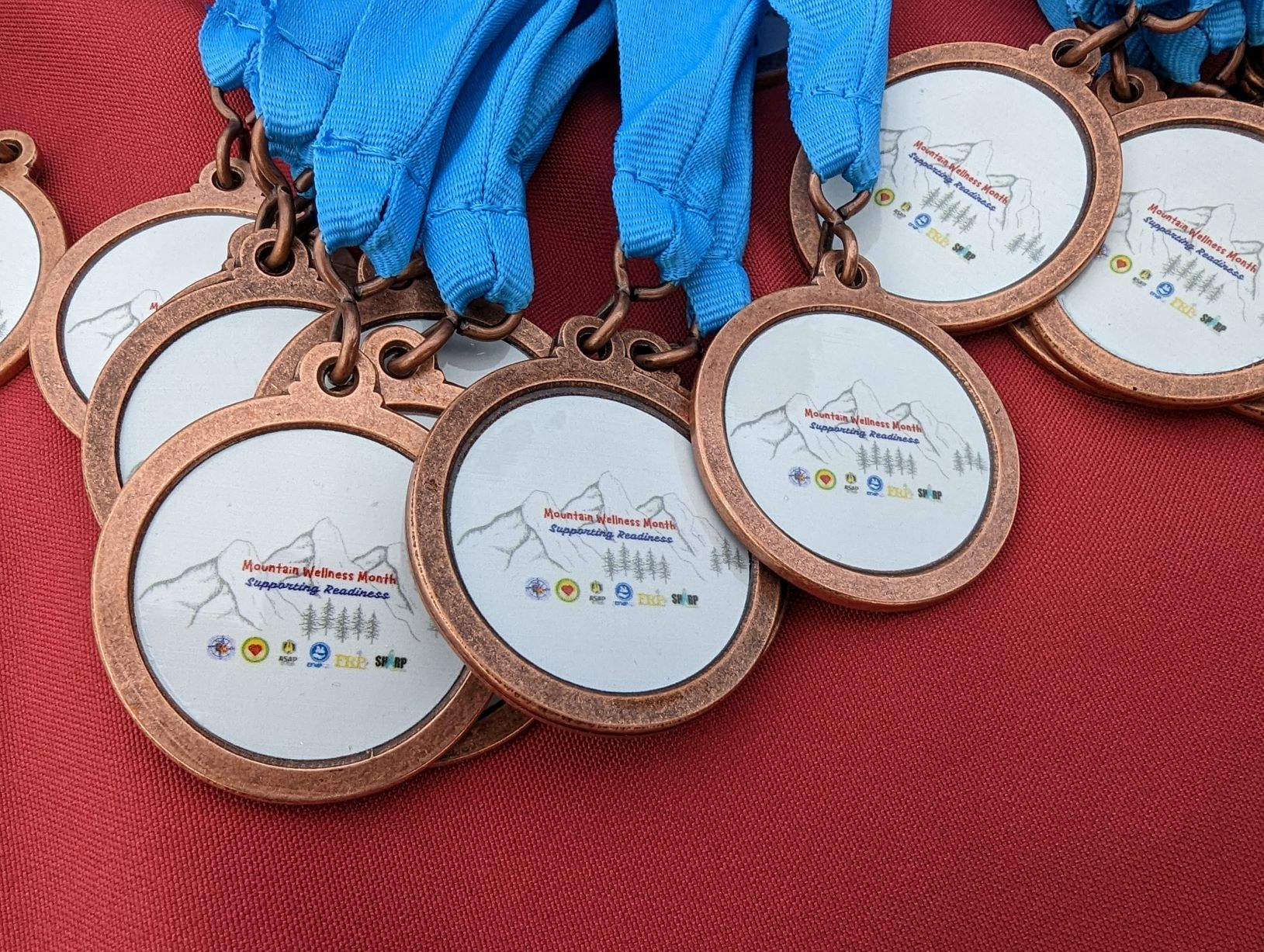 Mountain Wellness Month medal wb.jpg