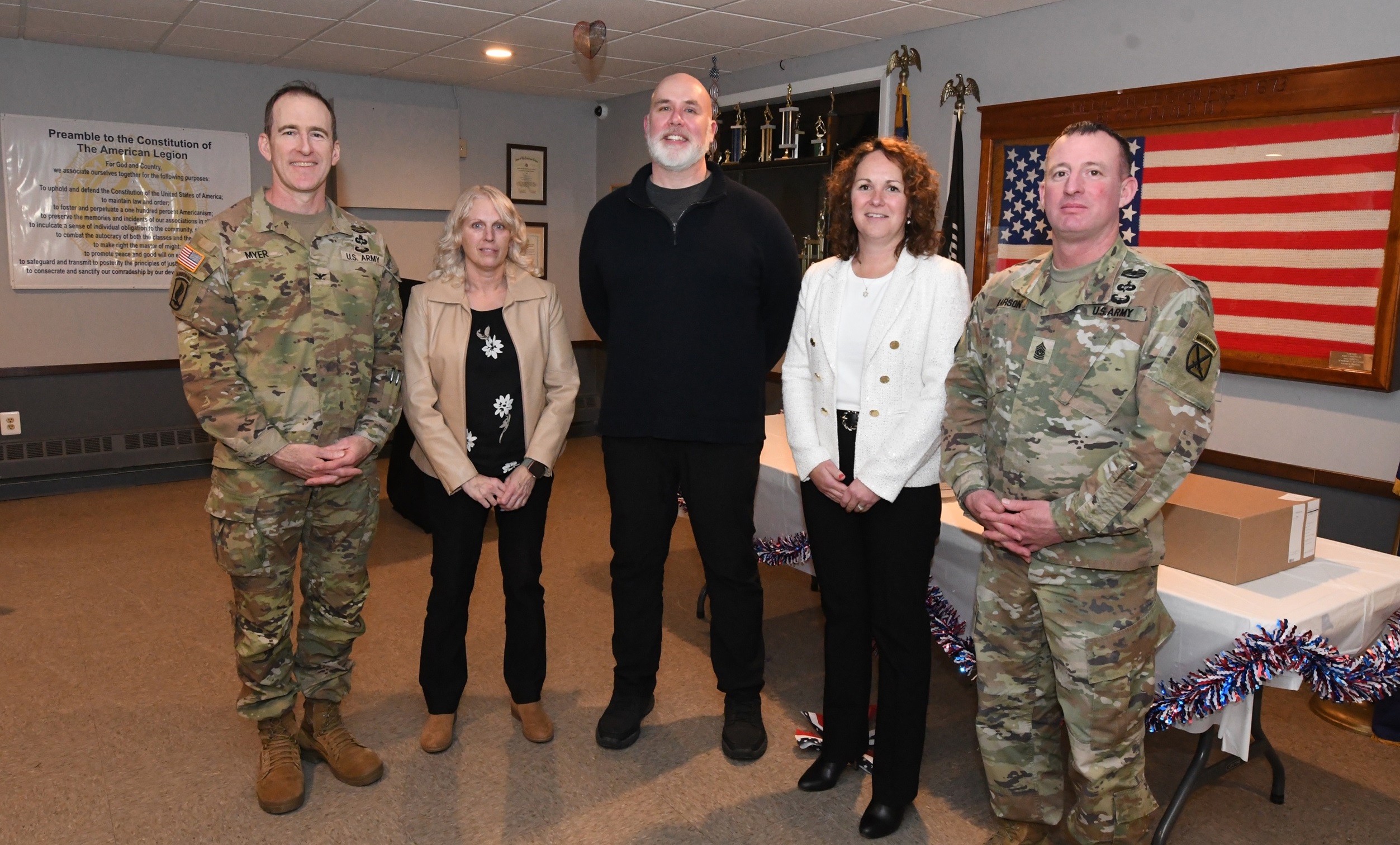 LEADER Class graduates pose with garrison commander and command sergeant major.