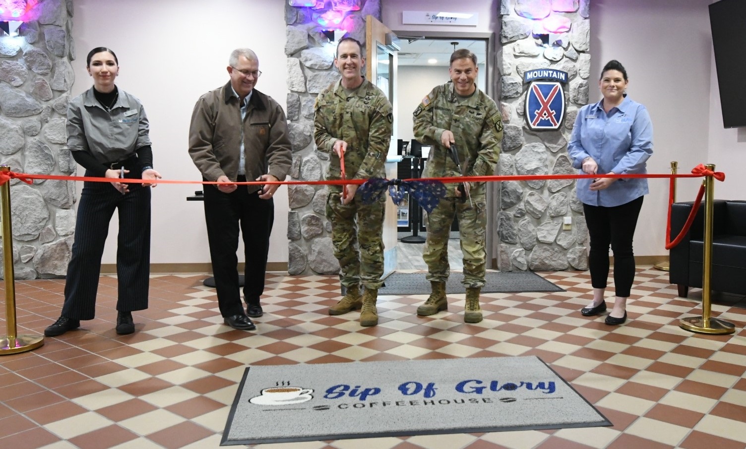 Fort Drum.officials cut ribbon on new coffeehouse on post.