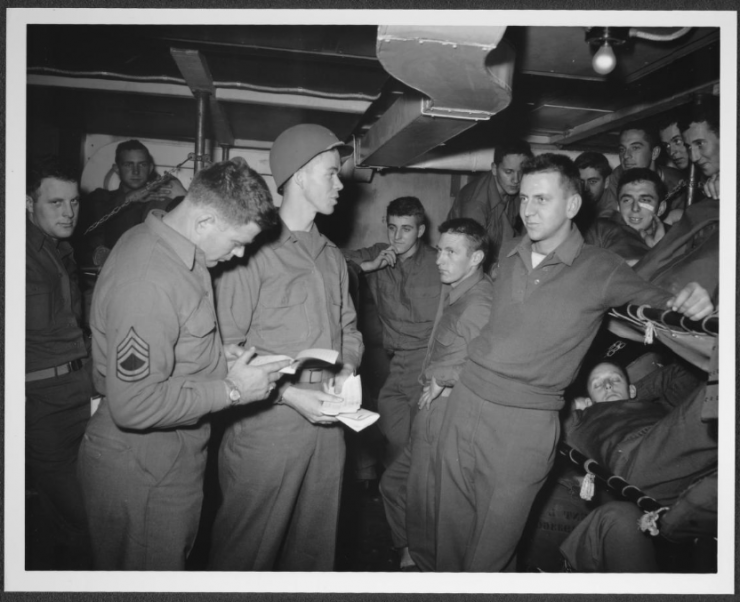servicemen in sleeping quarters