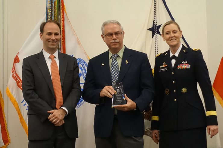 Stephen Rowley - award.jpg