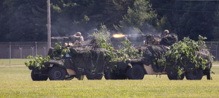 Soldier fire weapons during Live Demo at Mountainfest.