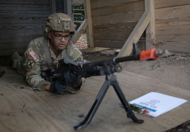 A Soldier prepares to fire the M249 during training on Fort Drum. 