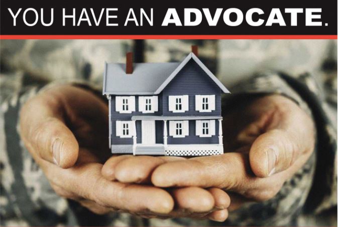 Soldier hands holding a house