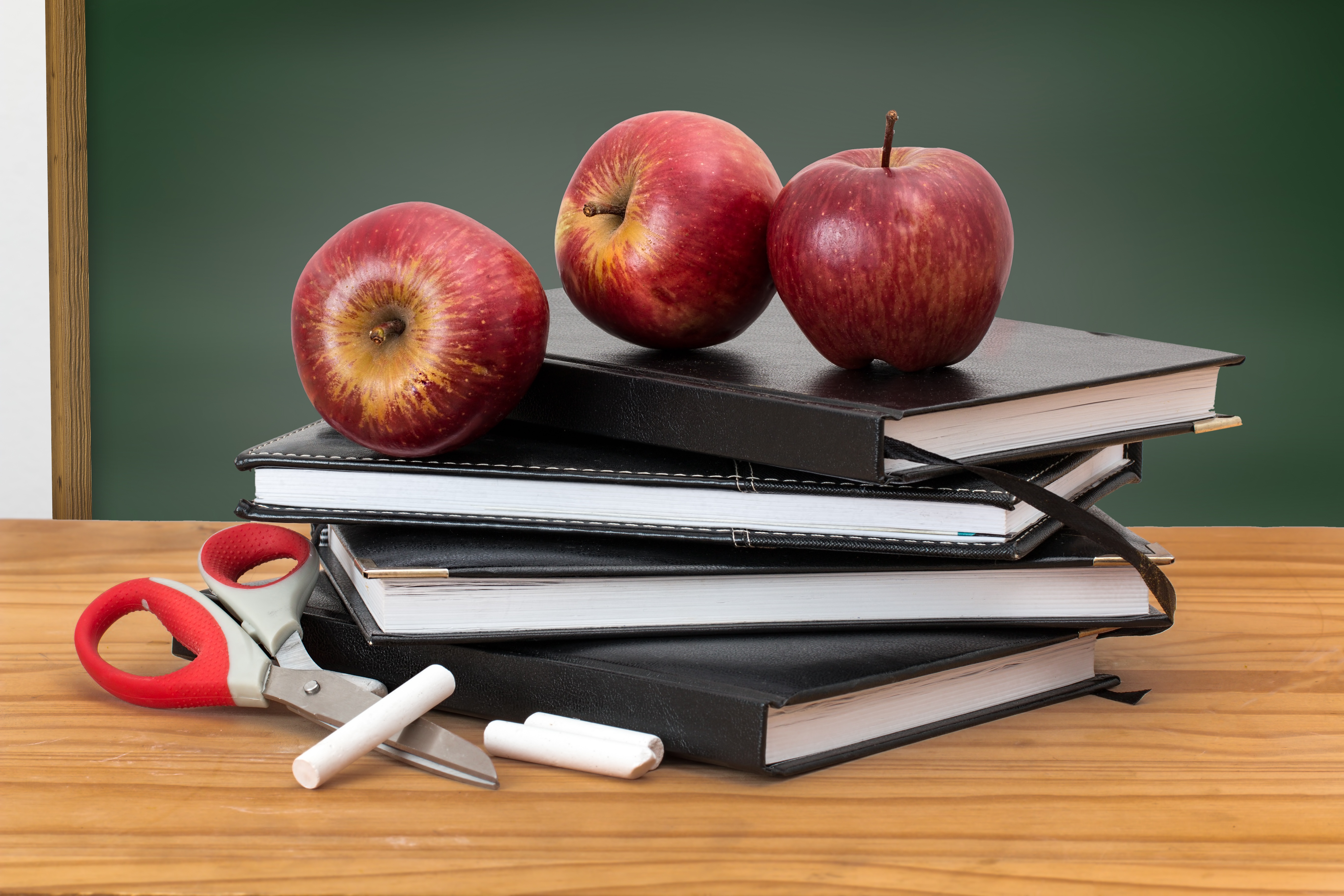 Stock photo of apple and books