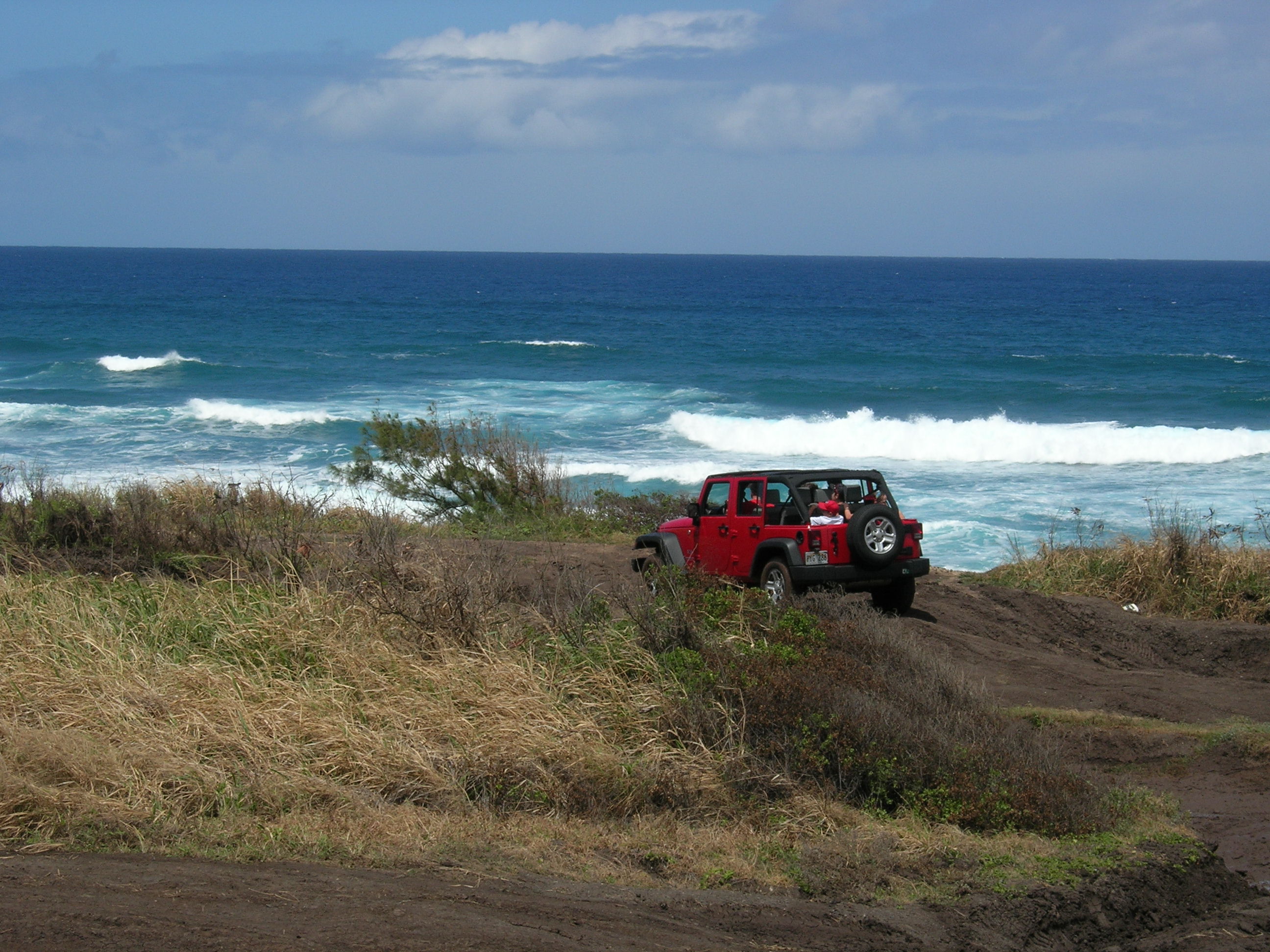 Stock photo of a Jeep off-roading at Kaena Point (Photo courtesy of the Hawaii Department of Land and Natural Resources)