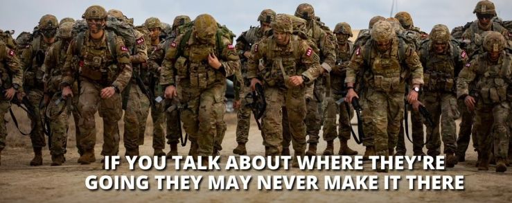 Soldiers walking together with the text written below them: If you talk about where they're going they may never make it there.