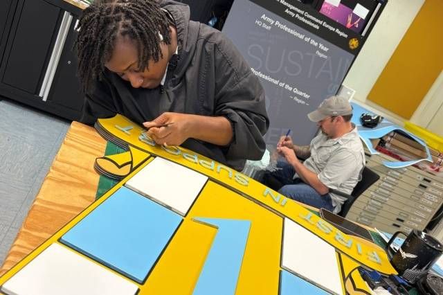 Enterprise Multimedia Center offers reimbursable graphic services, fosters unit pride