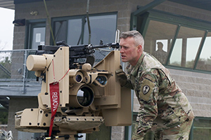 Photo: Sgt. Corbin Rud with the 79th Military Police Company boresights a Common Remotely Operated Weapon Station (CROWS) M-240 machine gun while training April 23 at Fort McCoy. Reserve Soldiers spent a week learning the system in Operator New Equipment Training in late April.