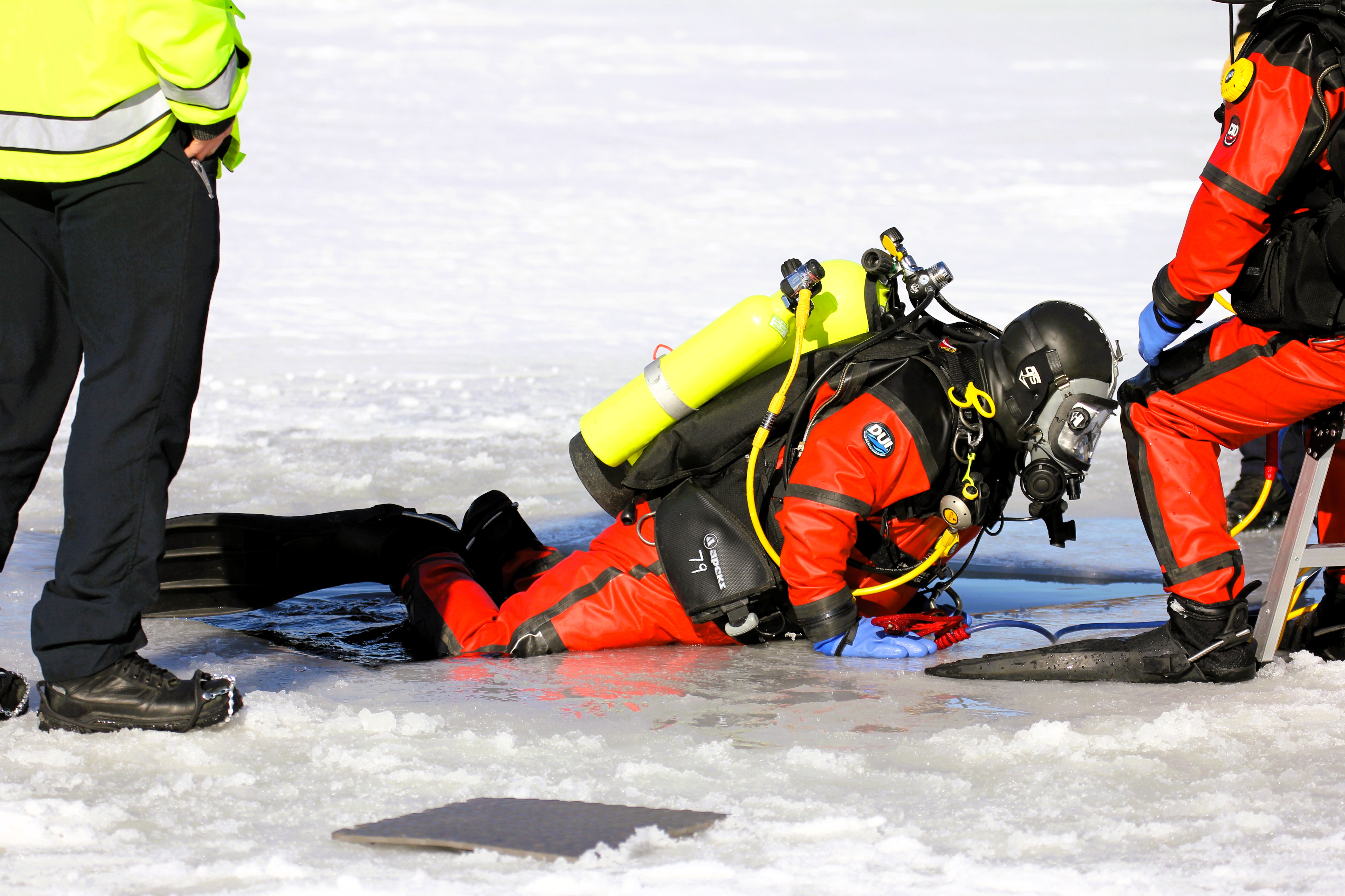 Fort McCoy DES Fire Department dive team holds February rescue training under ice