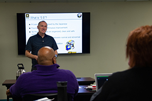 Photo: Garrison Deputy Commander Lt. Col. Alexander Carter teaches a Lean Six Sigma class March 2 at Fort McCoy.