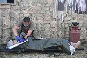 Photo: A Soldier trains with a medical dummy Aug. 5, 2020, at Fort McCoy, Wis.