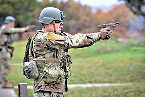 Photo: Soldiers with the 2nd Squadron, 106th Cavalry (2-106) of the Illinois National Guard M9 pistols Oct. 21 at a live-fire range at Fort McCoy. During their training on post in October, 2-106 Soldiers completed individual and crew weapons qualifications training.