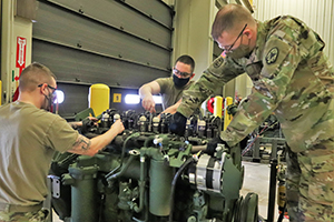 Photo: Soldiers in the Regional Training Site-Maintenance’s Construction Equipment Repairer Advanced Leadership Course work on equipment during course operations Feb. 2 at Fort McCoy. The course introduces students to subjects such as shop safety and management of operational, maintenance, and historical records and forms on construction-related equipment.