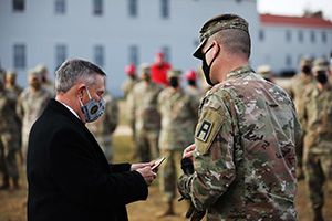 Photo: Soldiers with the 181st Multi-Functional Training Brigade, gathered for a brief ceremony with members of the Sparta Area Chamber of Commerce and other organizations to pay tribute to retired Col. Walter Haag for his 37 years of service to the U.S. Army Reserve on Dec. 17, 2020, at Fort McCoy.
