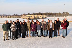 Photo: Garrison Commander Col. Michael Poss and Deputy to the Garrison Commander Brad Stewart are shown in a photo Feb. 15 with members of the Fort McCoy Directorate of Emergency Services. The garrison leaders made a special visit to thank them for six months of support for Operation Allies Welcome.