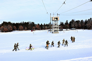 Photo: Cold-Weather Operations Course (CWOC) Class 21-03 students participate in a training scenario Jan. 28 at Fort McCoy.