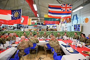 Photo: U.S. Air Force Lt. Gen. Joseph T. Guastella, Jr., Commander, U.S. Air Forces Central Command and Combined Forces Air Component Commander, and U.S. Air Force Chief Master Sgt. Shawn L. Drinkard, Command Chief Master Sgt. for USAFCENT, walk to a dining facility on Kandahar Airfield, Afghanistan to eat lunch with Airmen during a visit to the 451st Air Expeditionary Group, based at KAF to talk about the importance of the USAFCENT mission in Afghanistan, Feb. 24, 2020.