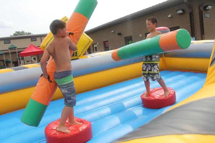 Photo: School Age Center/Youth Center students try out jousting during the Summer Sizzle event Aug. 5, 2021, at Fort McCoy, Wis. 
