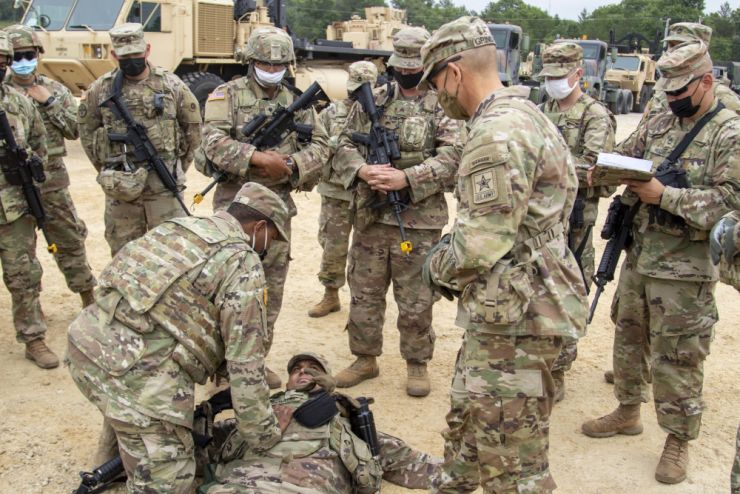 Photo: Sergeant Maj. of the Army Michael A. Grinston, express his concern about pre-combat checks and pre-combat inspections to Soldiers from 645th Inland Cargo Transit Company, 79th Theater Command July 21, at Fort McCoy, Wis.