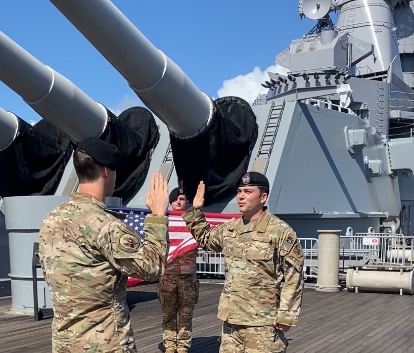 548 CTS Member Reenlists on USS Missouri at JB Pearl-Harbor Hickam, HI