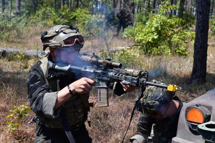 The Special Purpose Forces conducts a raid on a local town.